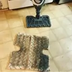 Cleaning a dirty steam mop head