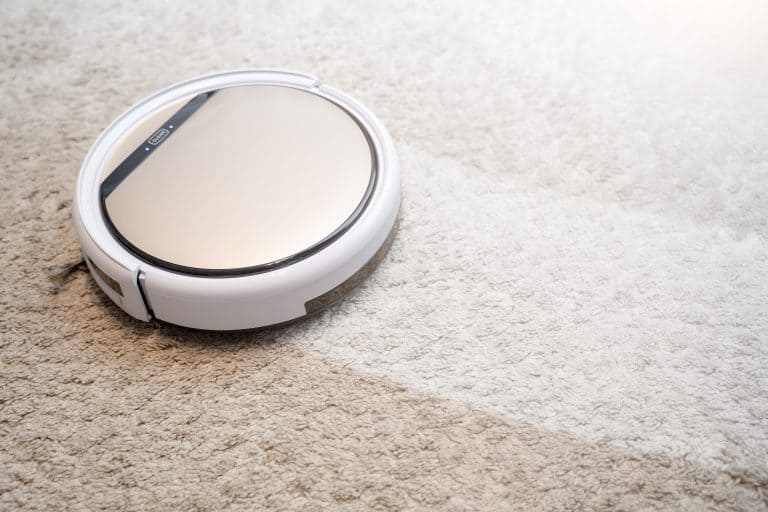 Robotic vacuum cleaner cleaning the carpet
