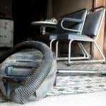 Old vacuum cleaner in a dusty house