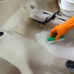 Cleaning a car carpet with the best car carpet cleaner solution