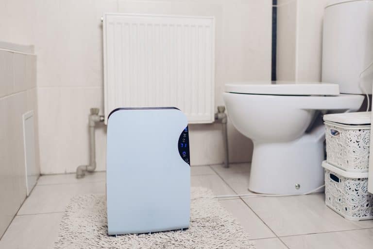 Dehumidifier in bathroom.