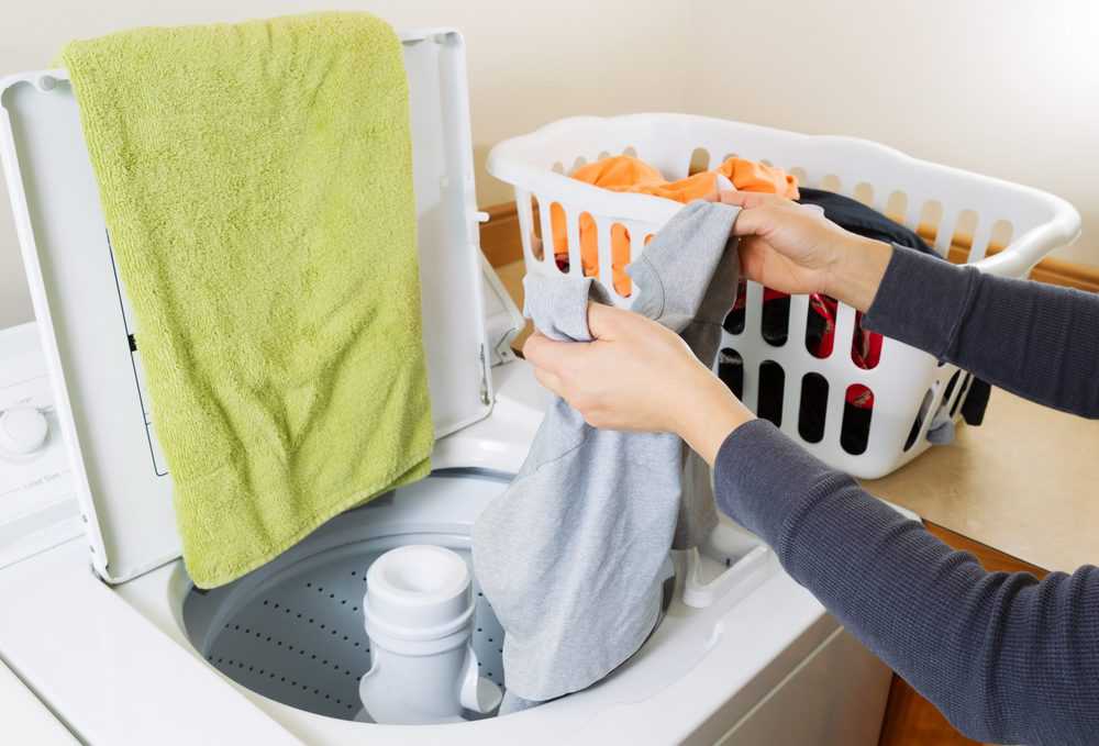 Woman washing laundry exposed to bedbugs