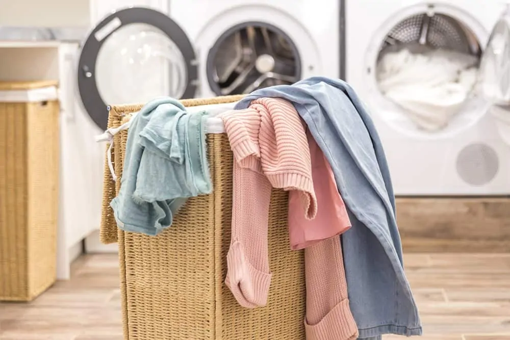 Laundry sorter with a pile dirty clothes