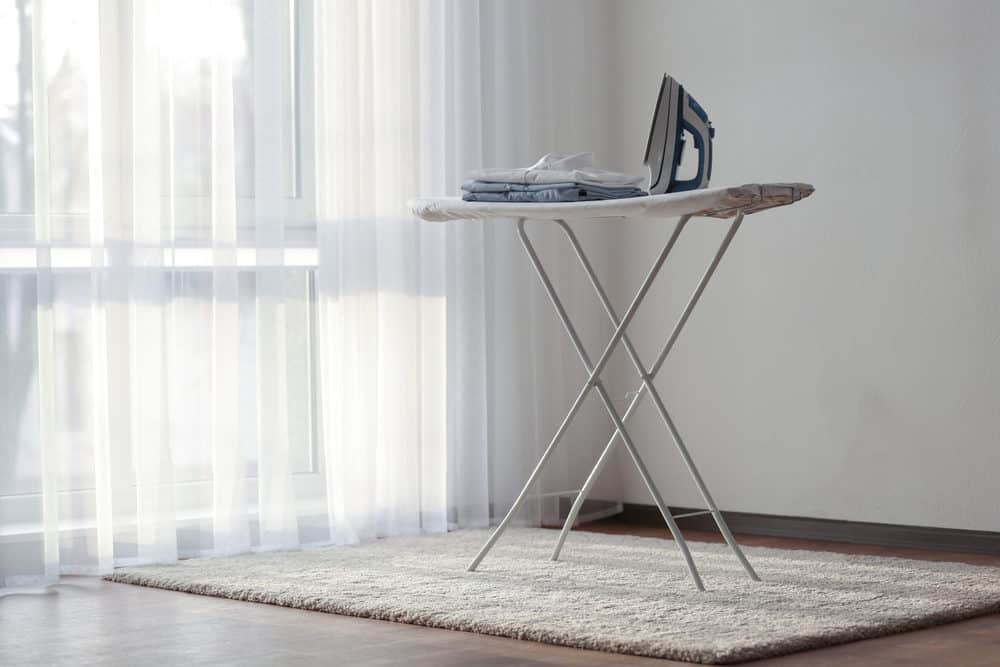 how to close ironing board