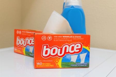 Boxes of dryer sheets and a bottle of fabric softener