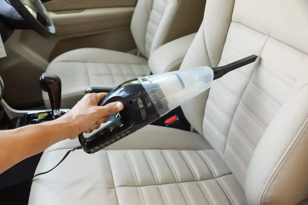Car detailing using a vacuum cleaner