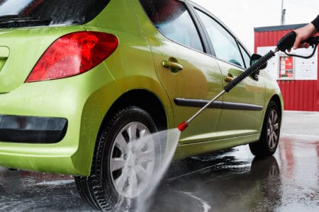 Cleaning car with pressure washer