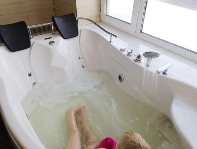 Girl bathing in a hot tub
