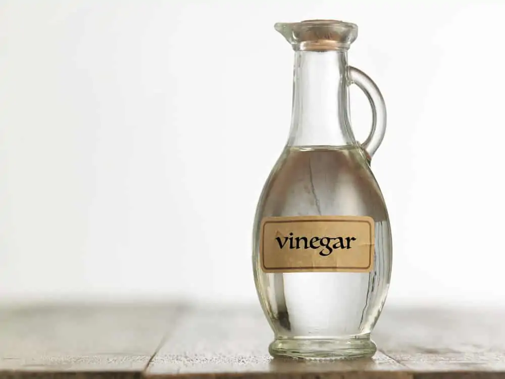 White vinegar on the wooden table top