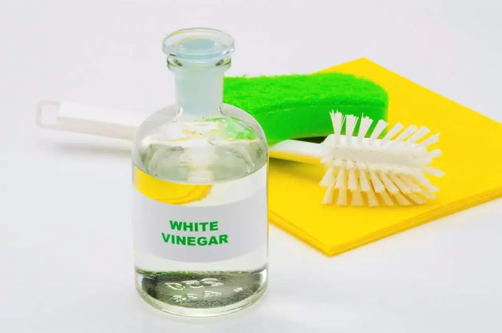 White vinegar in a glass bottle