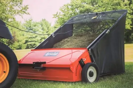 Lawn sweeper full of leaves
