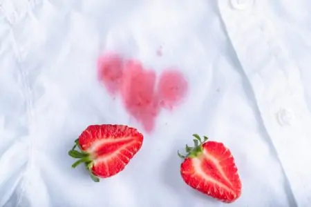 White cloth with stains from strawberries