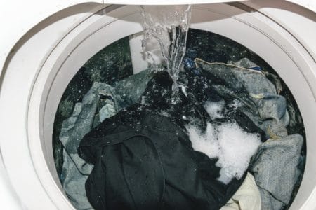 Clothes and water in washing machine