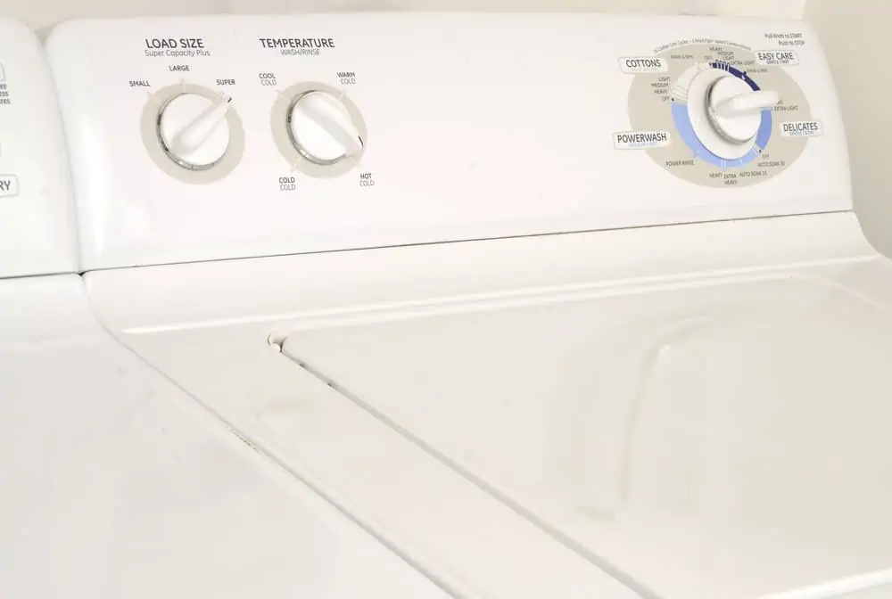 White top load washer and dryer