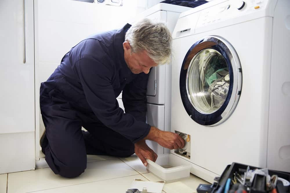 whirlpool front load washing machine leaking from bottom