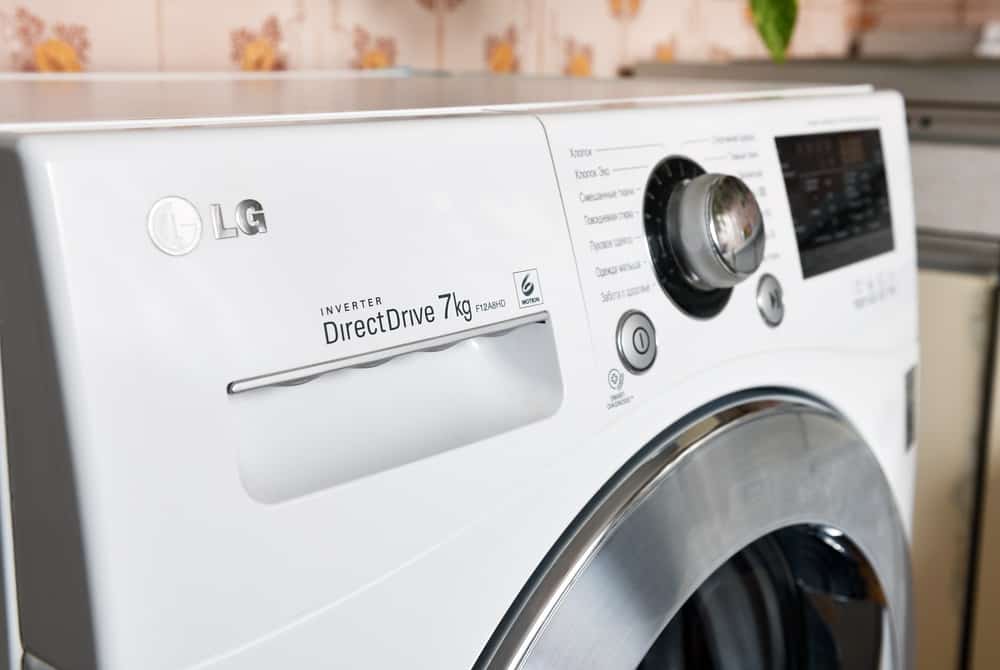 White lg front load washing machine