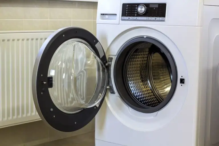 Open white front load washing machine