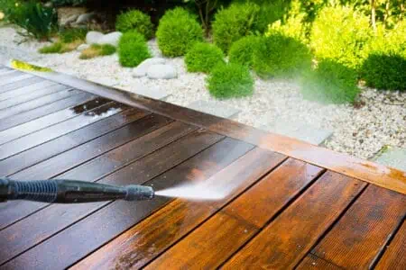 Cleaning terrace wood deck with power washer